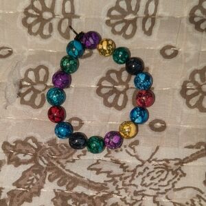 Multi-colored 10.mm.round Beads.